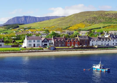 view from lakeside near small Scottish town