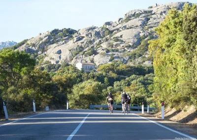 Sardinia hillside view of cyclists
