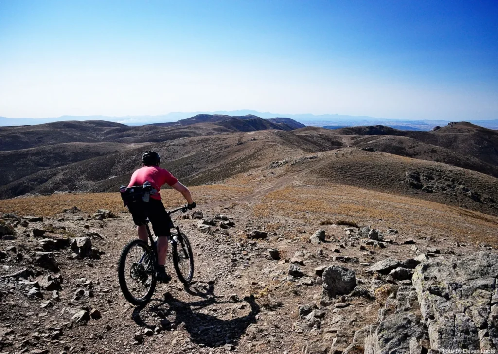 mountain biker riding technical terrain in Sardinia